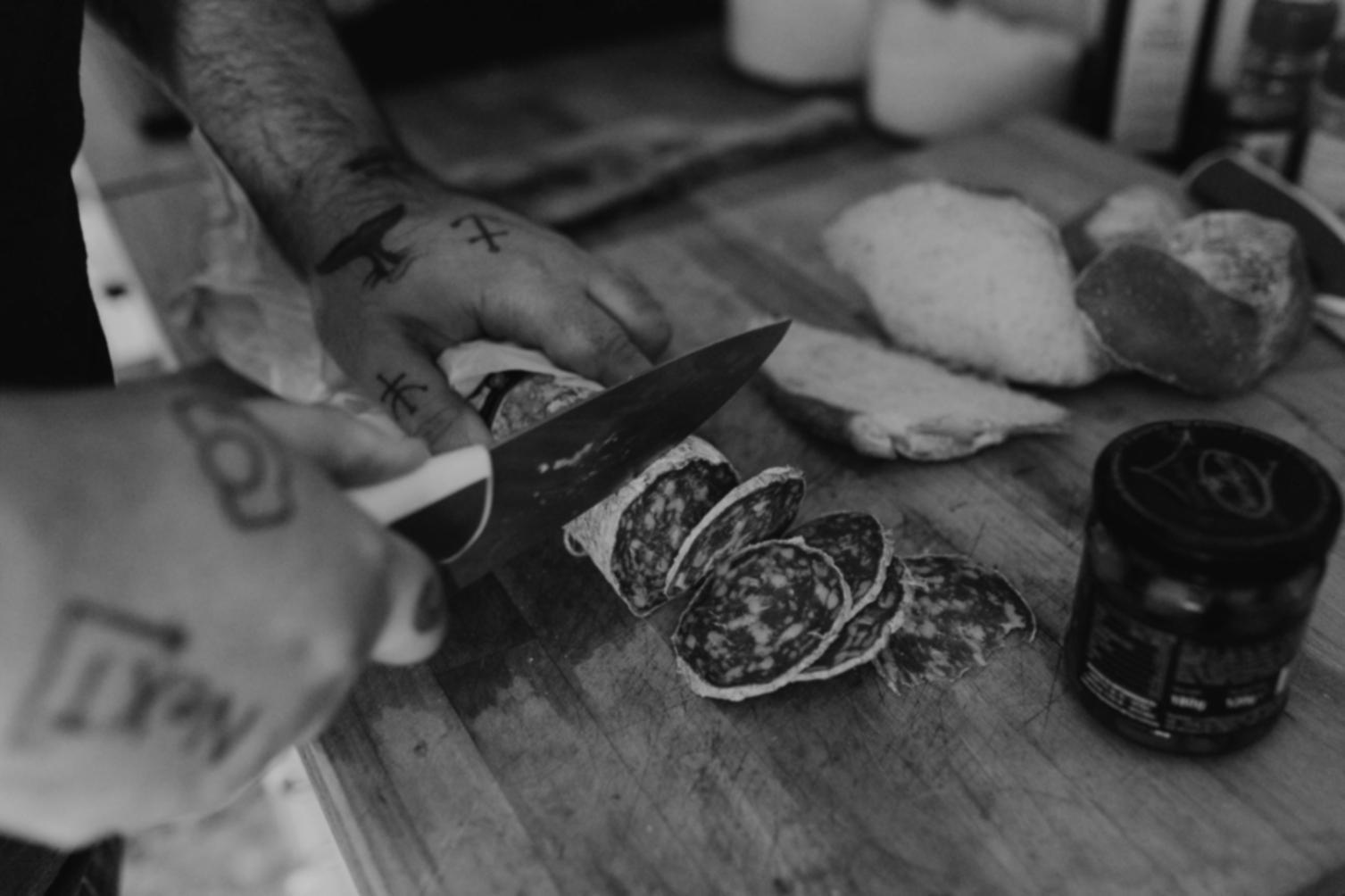 Traditional Italian pizza ingredients and preparation tools